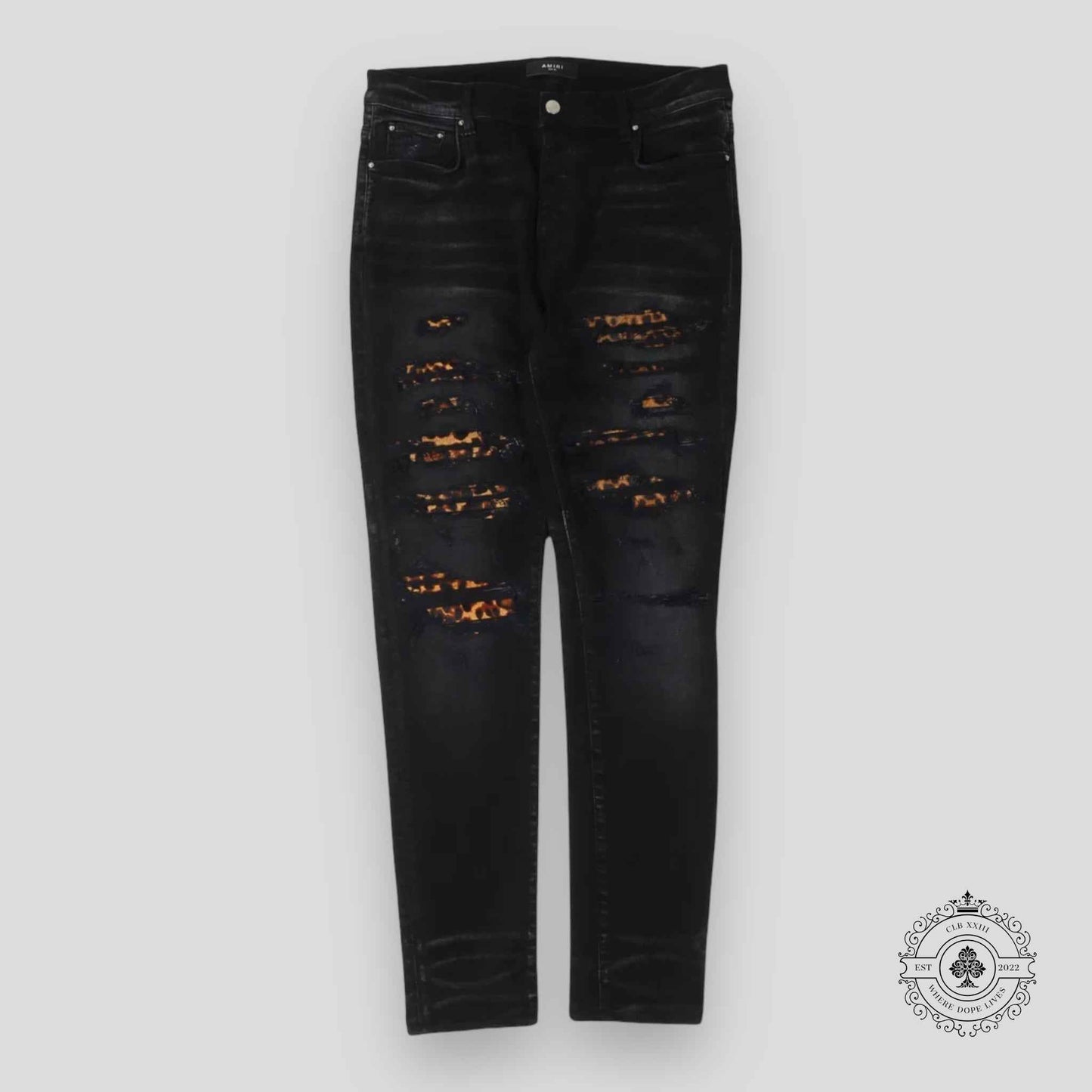 Amiri Leopard Patch Thrasher Jeans in Black