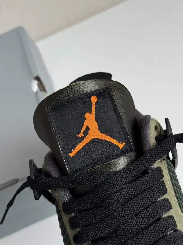 Undefeated x Air Jordan 4 Retro – Olive and Black