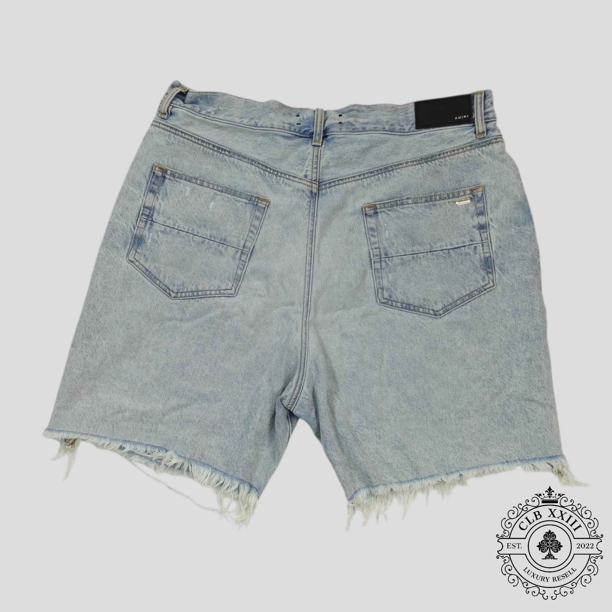 Amiri Tie Dye Thrasher Jean Shorts in Light Wash