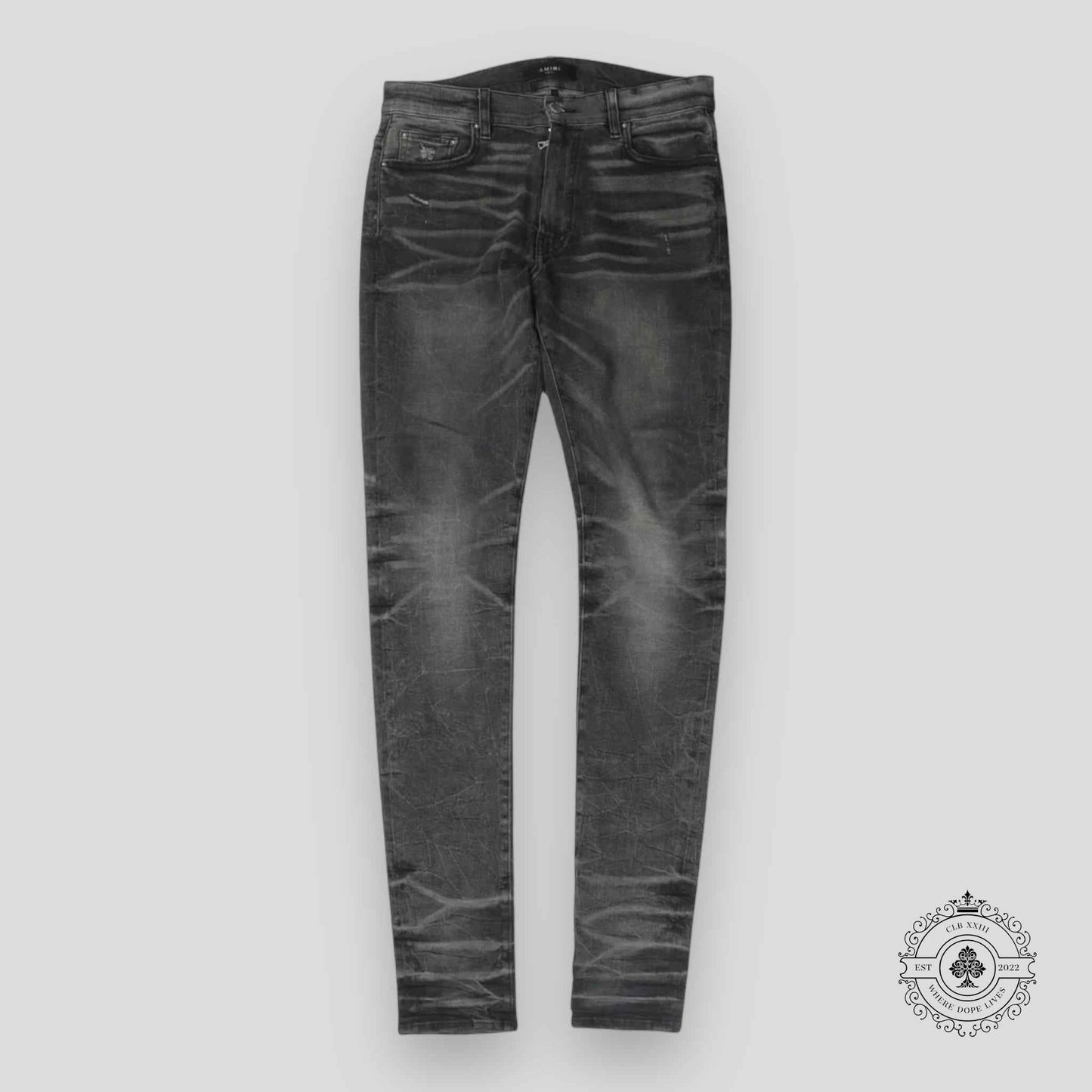 Amiri Faded Denim Jeans in Grey
