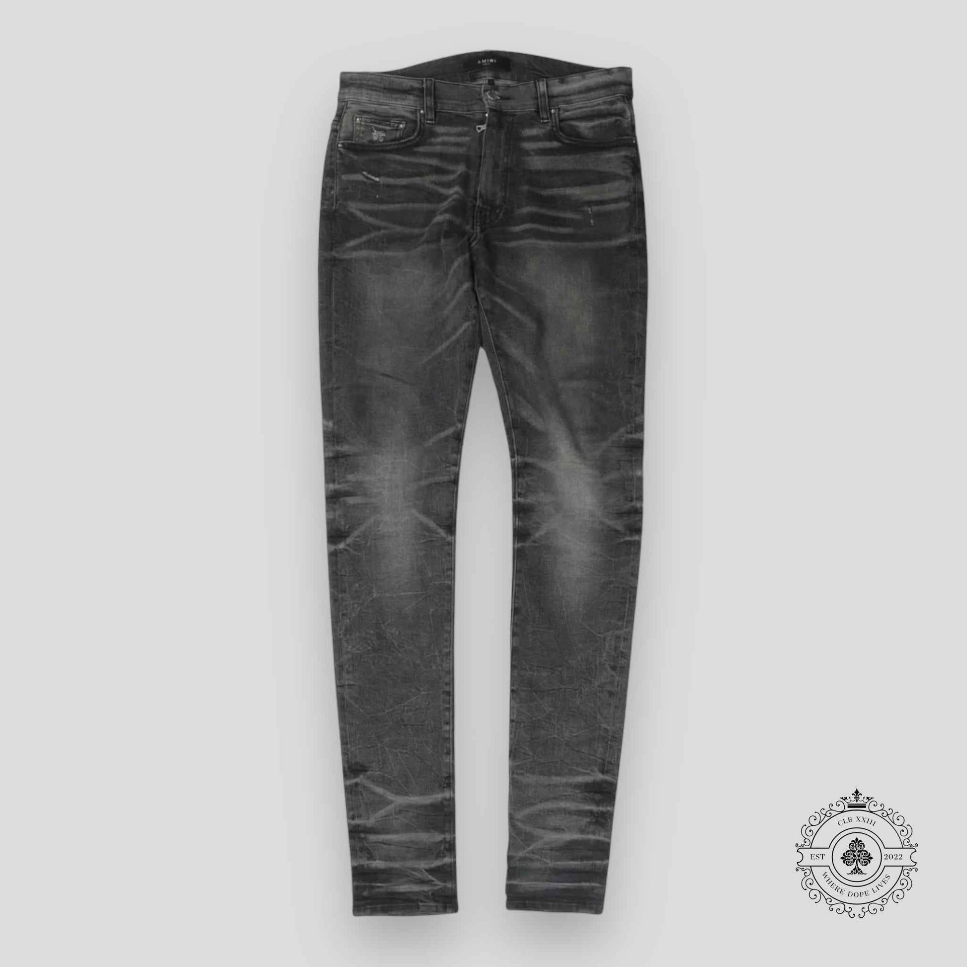 Amiri Faded Denim Jeans in Grey