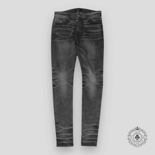 Amiri Faded Denim Jeans in Grey