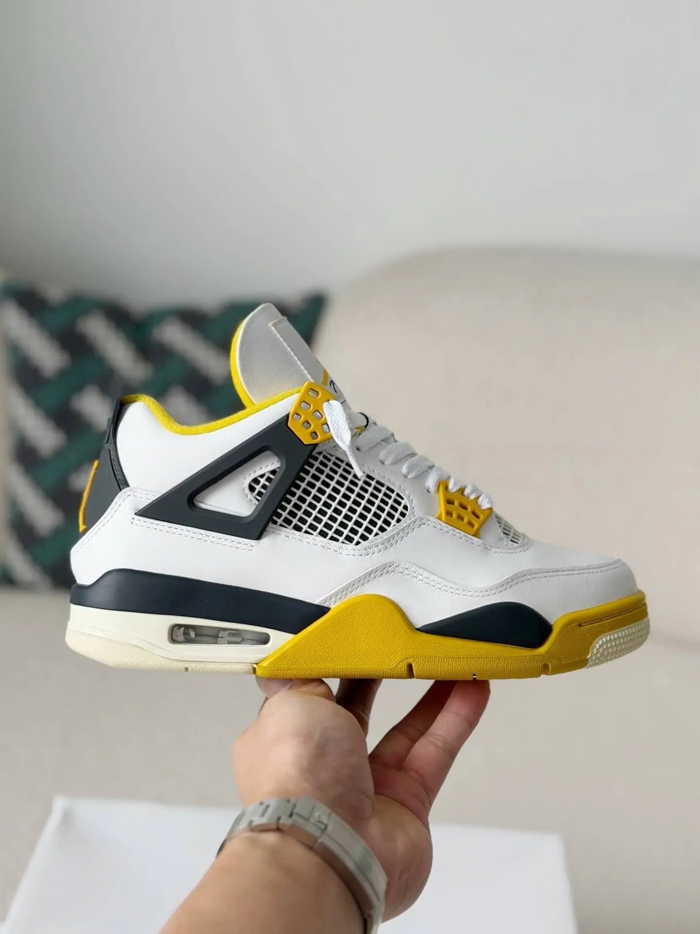 Air Jordan 4 Retro ‘Vivid Sulfur’ Sneakers