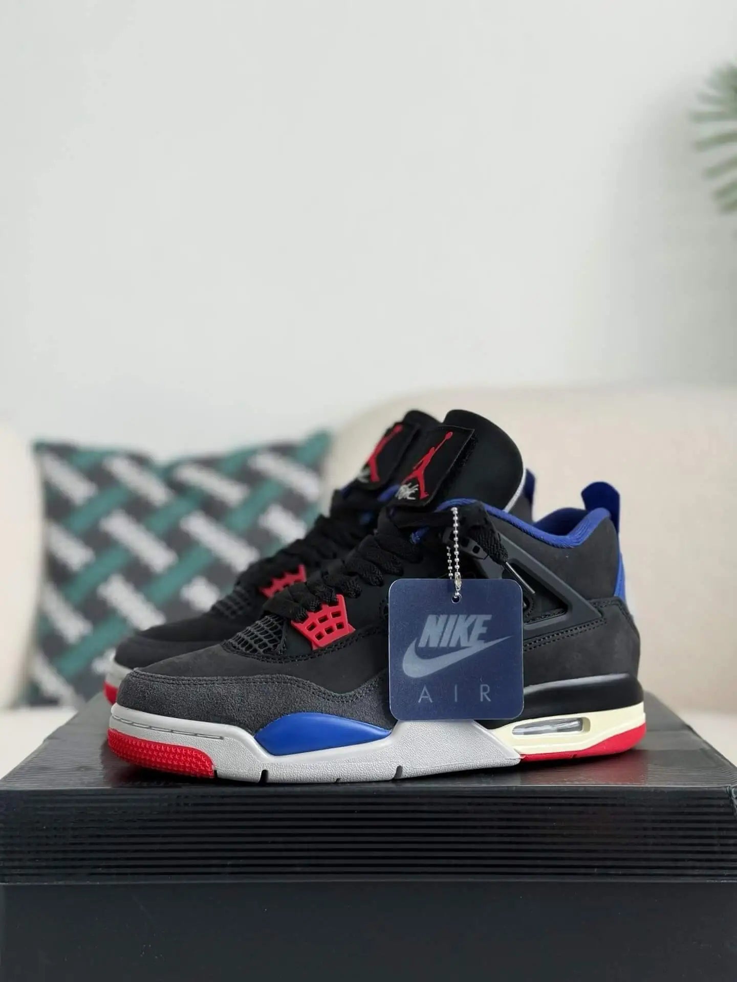 Air Jordan 4 Retro ‘Rare Air’ in Black, Royal Blue, and Red