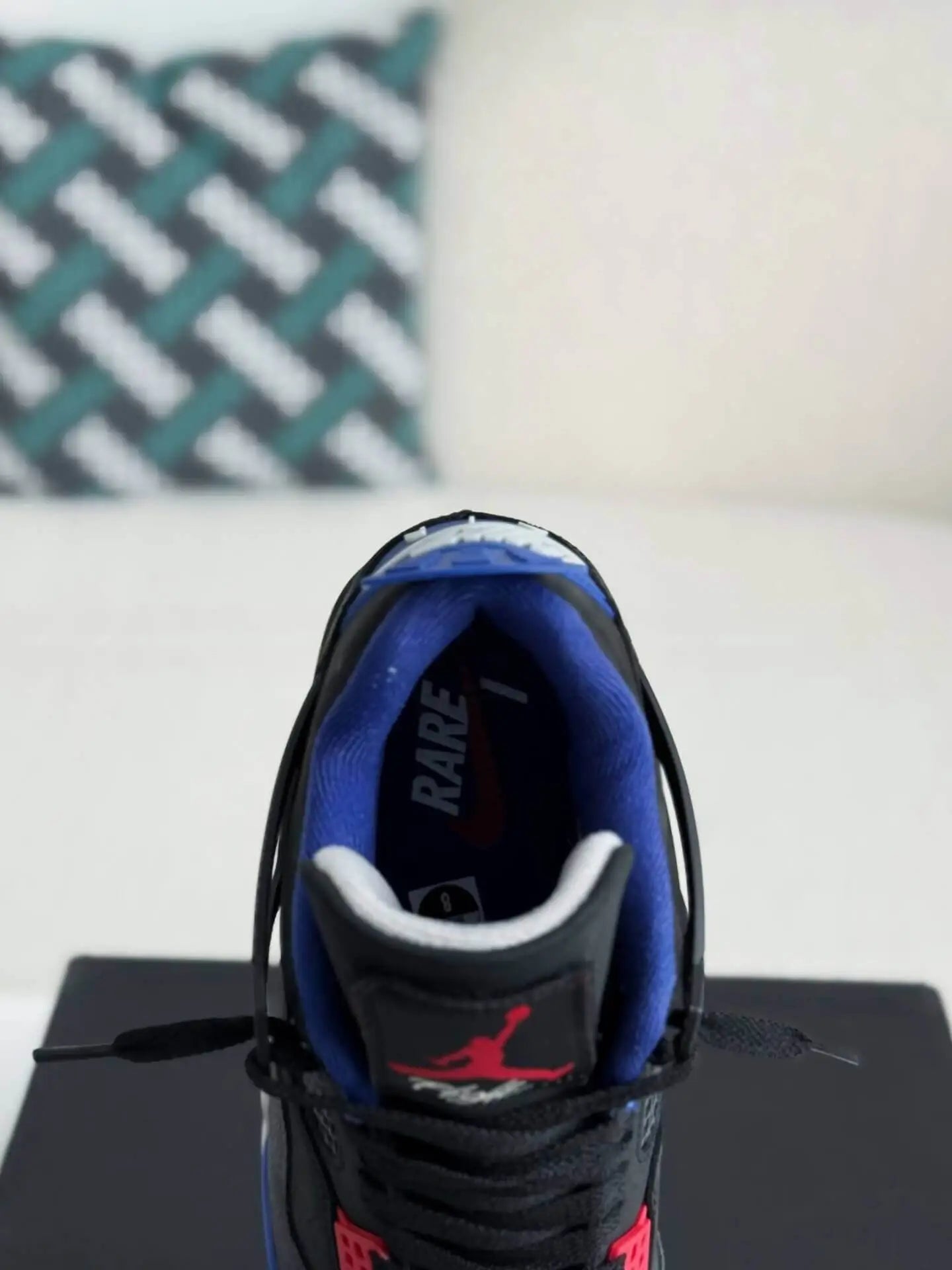 Air Jordan 4 Retro ‘Rare Air’ in Black, Royal Blue, and Red