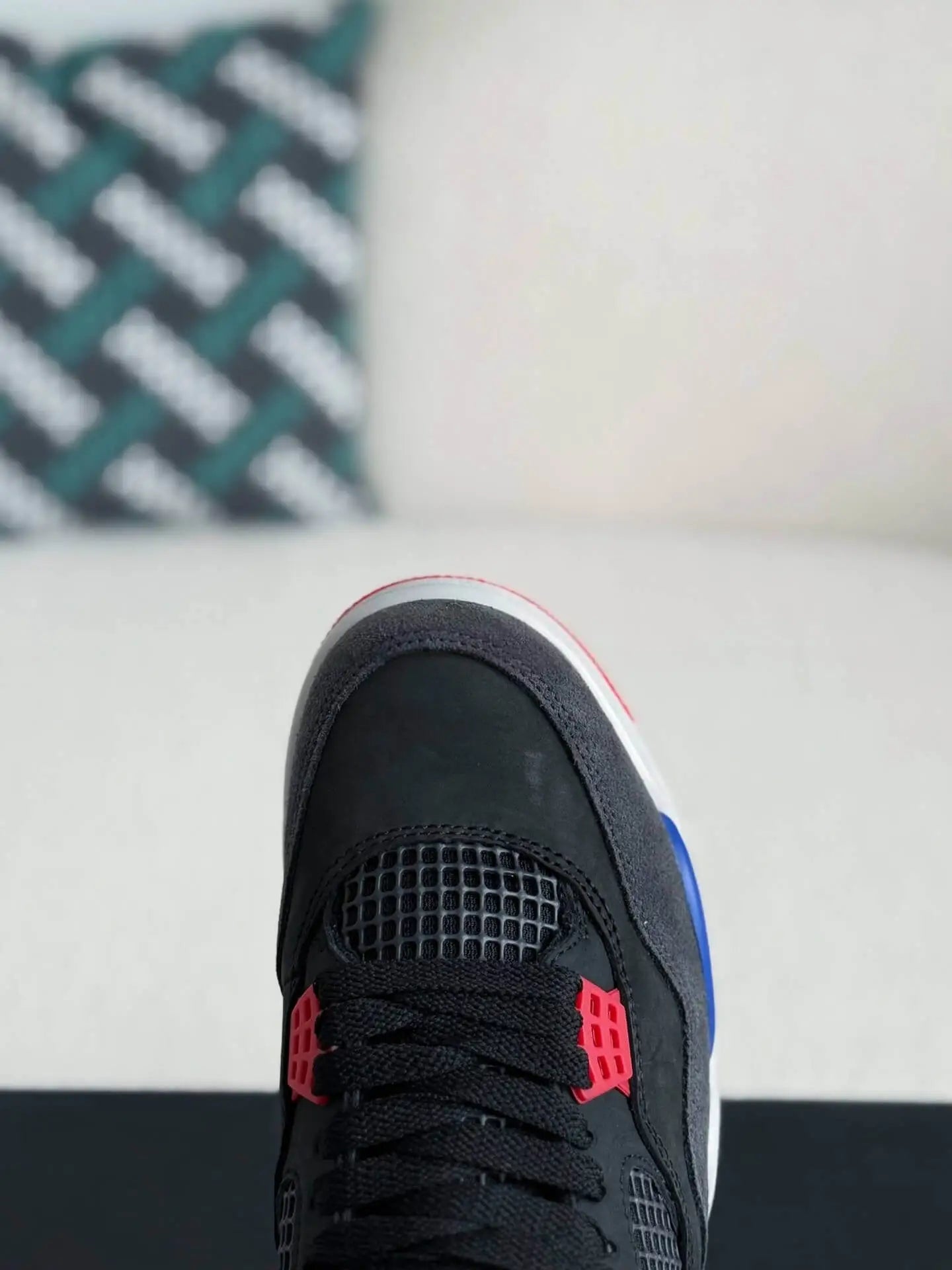 Air Jordan 4 Retro ‘Rare Air’ in Black, Royal Blue, and Red