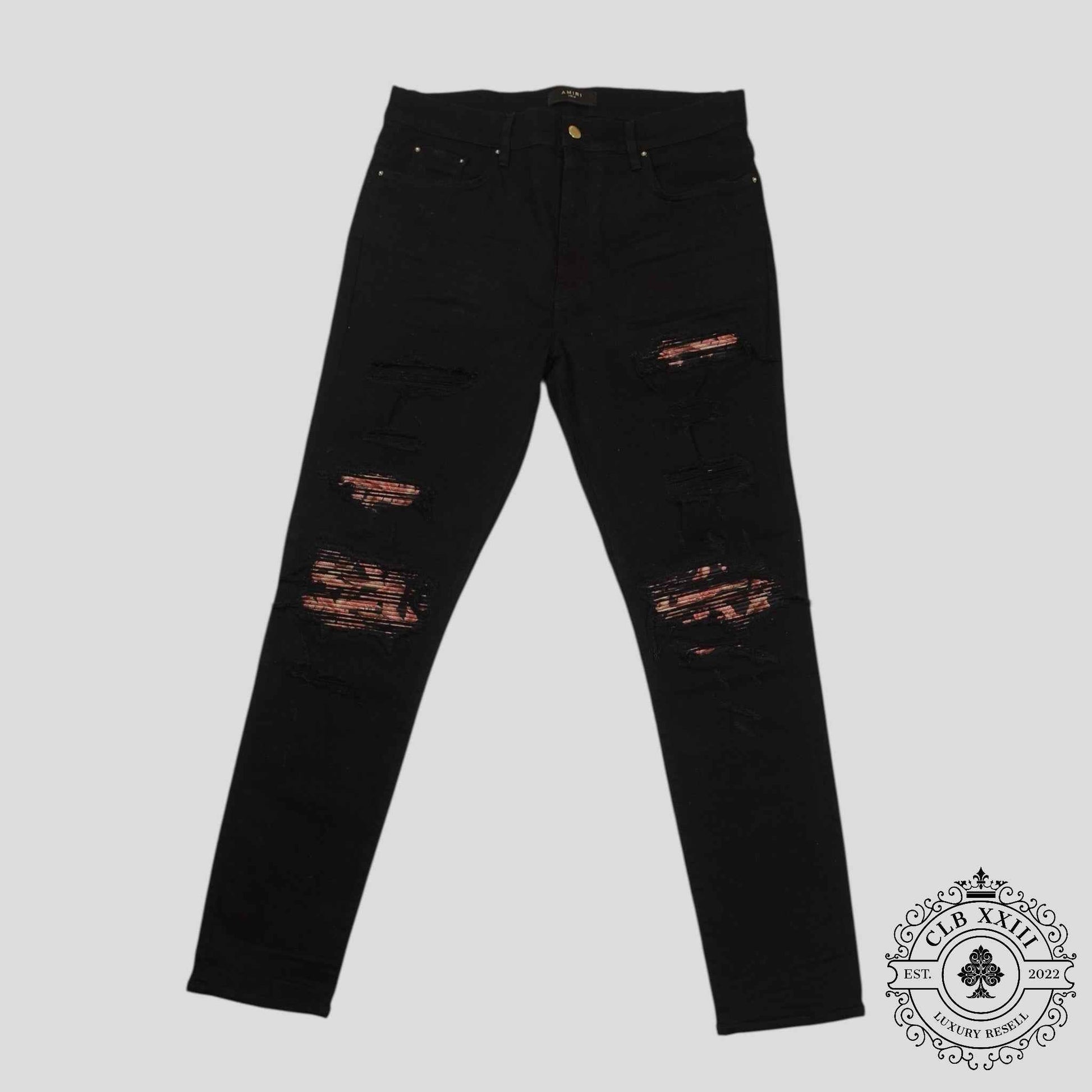 Amiri Banana Leaf Patch Thrasher Jeans in Black