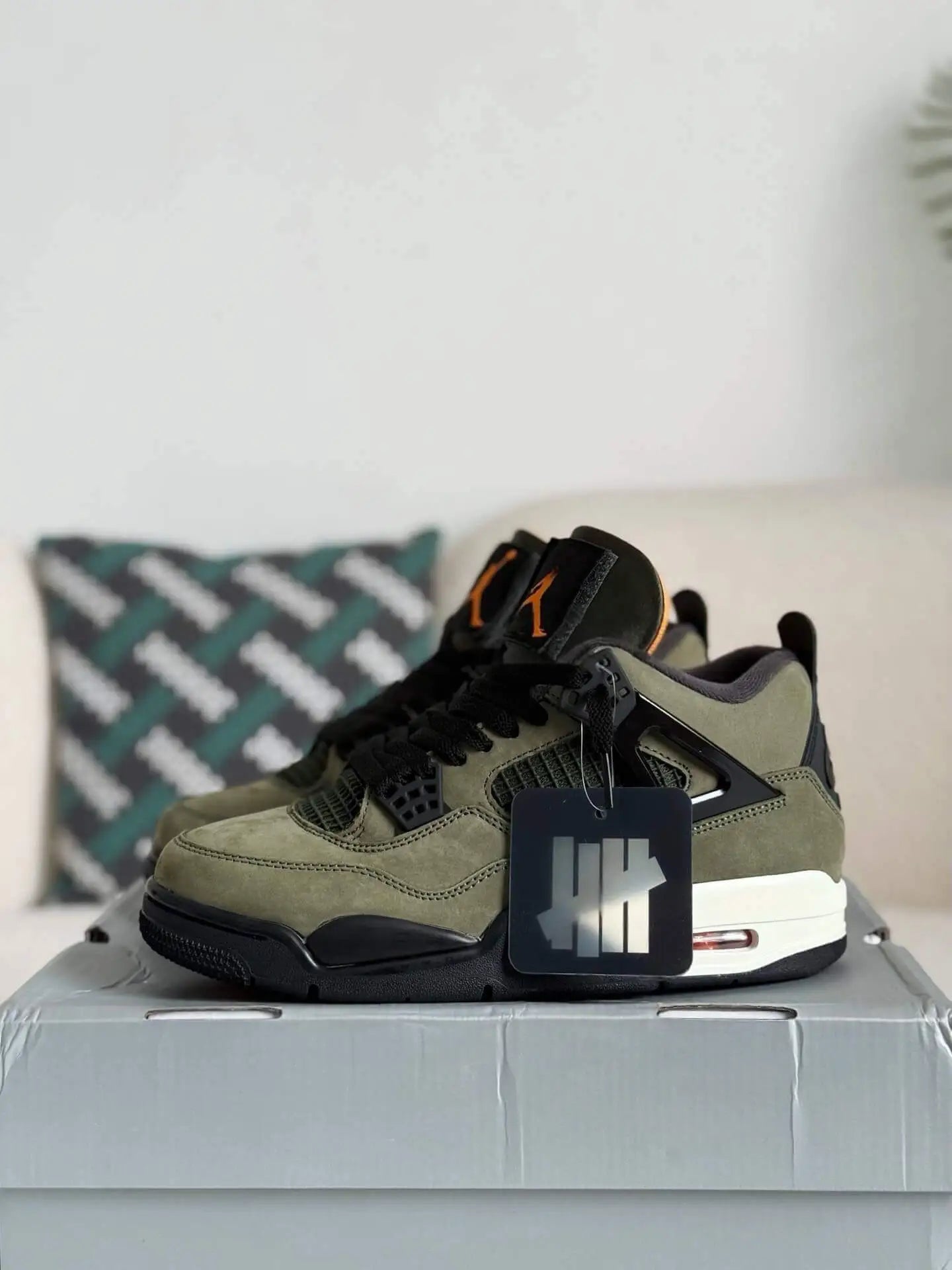 Undefeated x Air Jordan 4 Retro – Olive and Black
