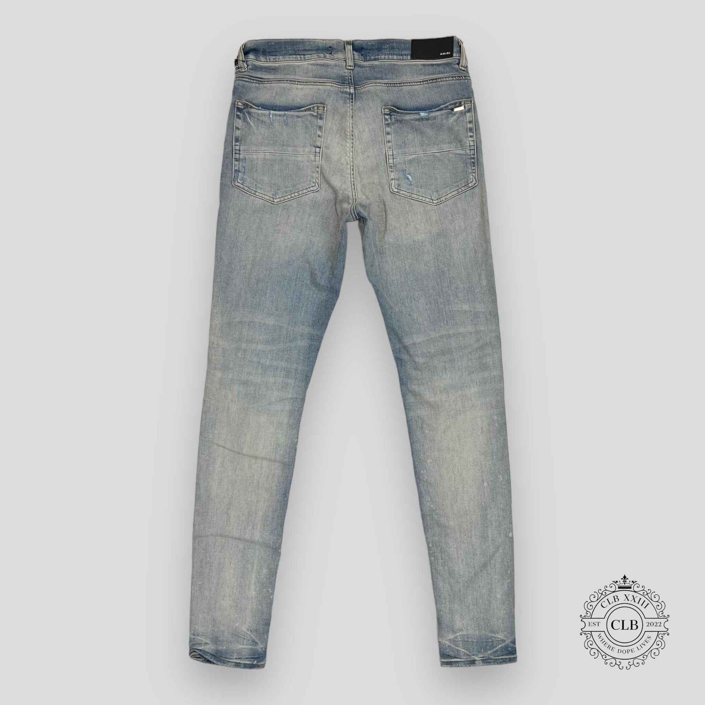 AMIRI MX1 CRACKED PAINT JEANS - CLAY INDIGO/PINK