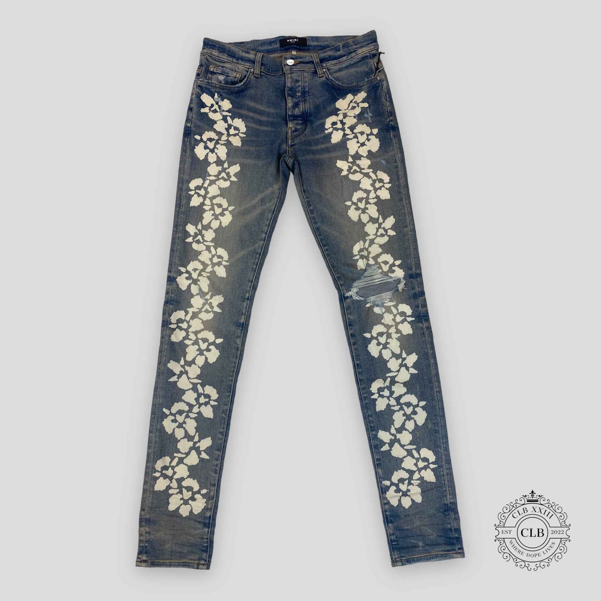 Amiri Hibiscus Stencil Jeans in Light Indigo