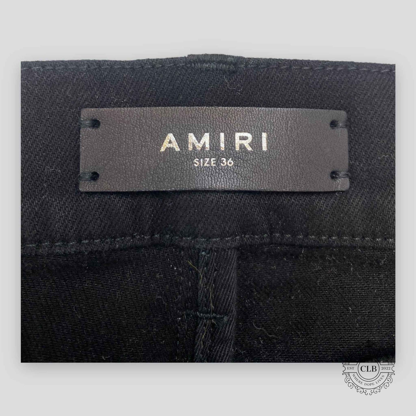 Amiri Hawaiian Star Art Patch Jeans in Black